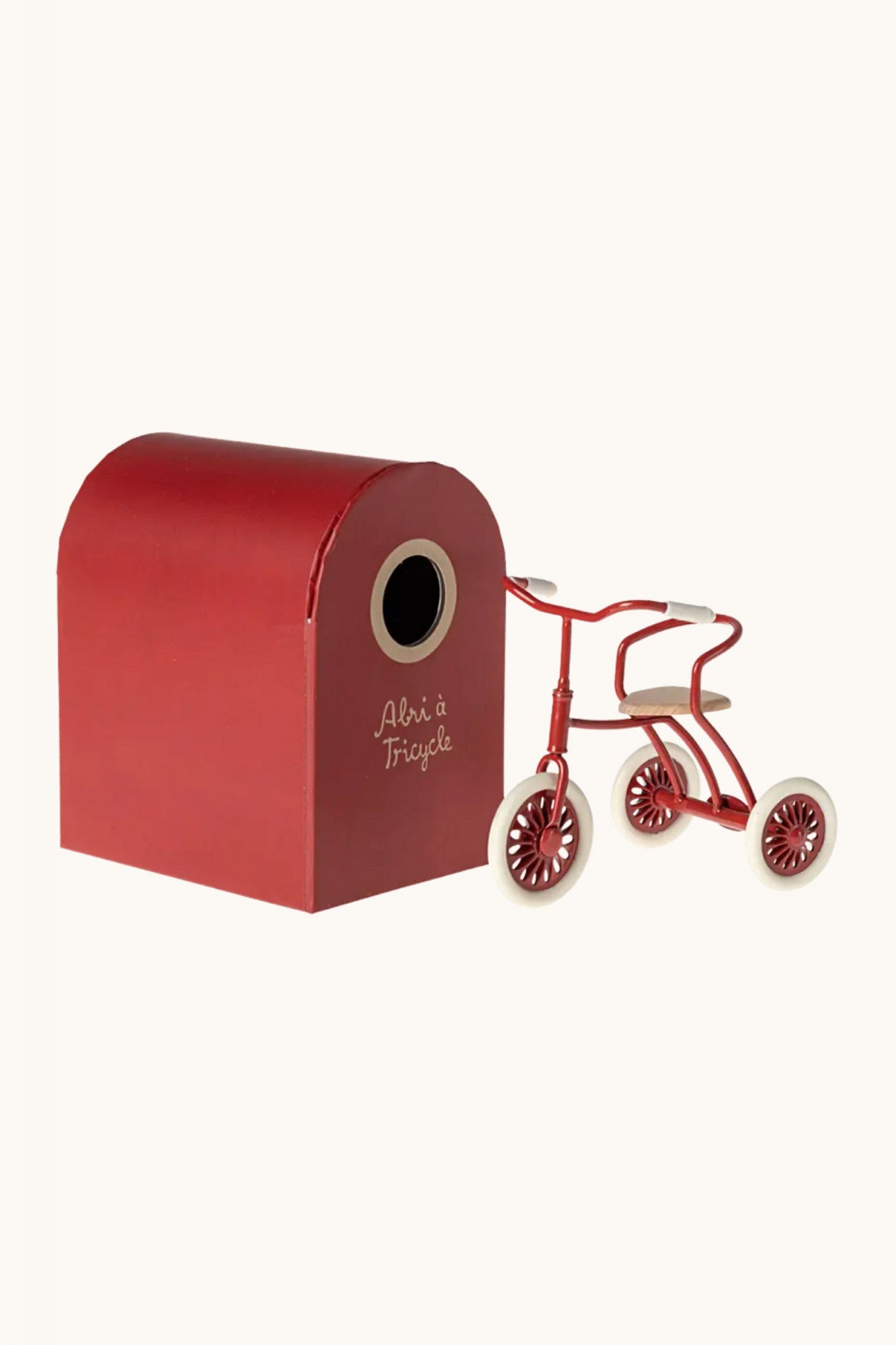 red shelter and tricycle from Maileg