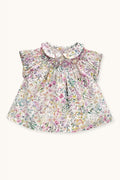 Pirouette baby blouse hand-smocked in Liberty