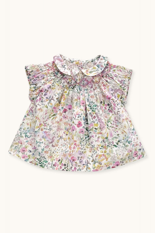 Pirouette baby blouse hand-smocked in Liberty
